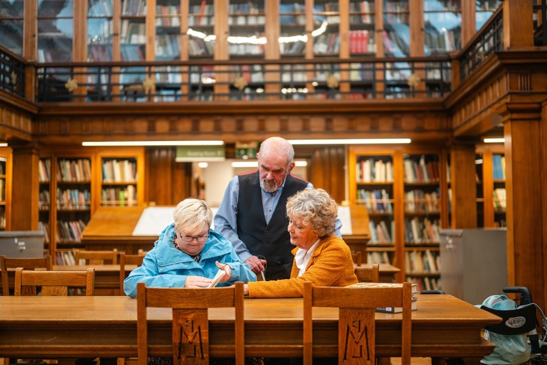 seniors reading books together