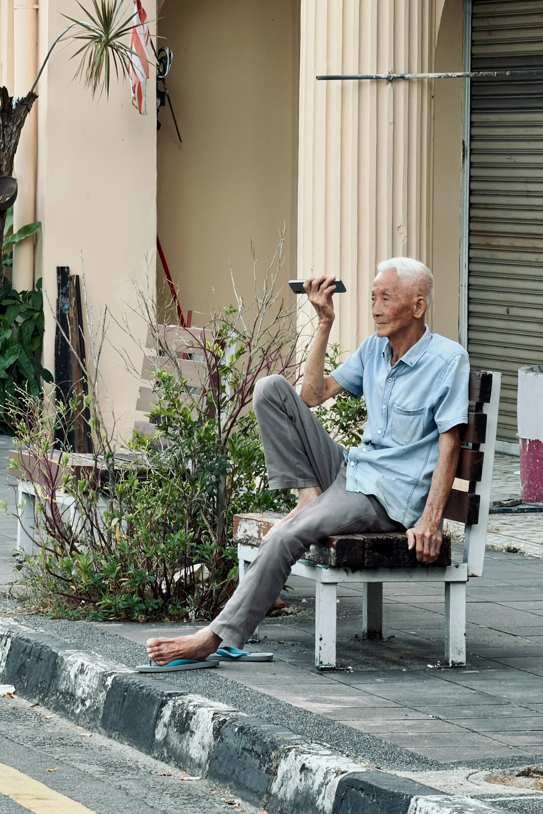 senior relaxing on bench