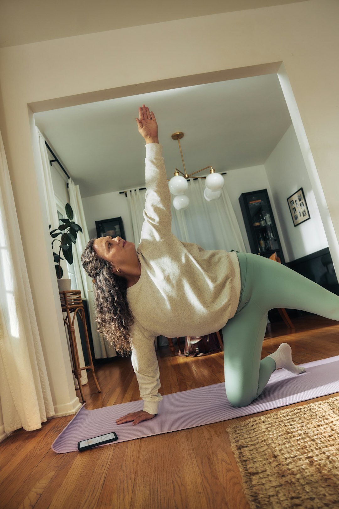 elderly woman doing yoga