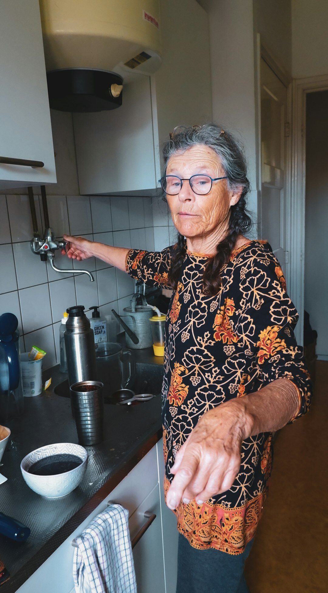 elderly woman cooking